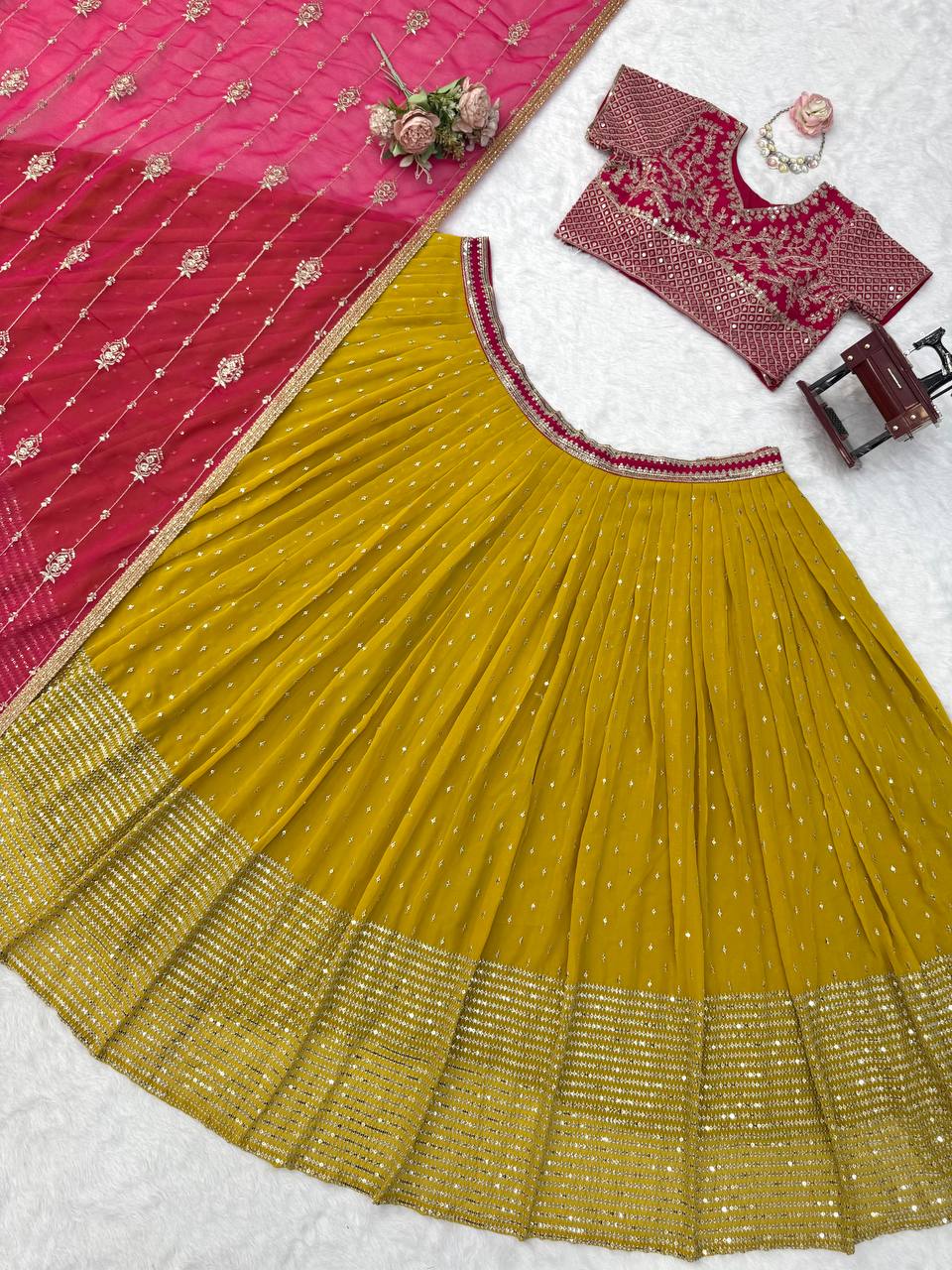 Vibrant Sunshine Yellow and Fuchsia Pink Designer Lehenga Choli with Dazzling Shimmer Embellishments